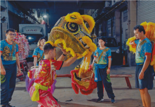Peruvian young man into Chinese lion dance
