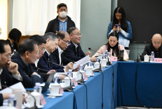 Chinese democracy in action: a village bench meeting shapes national law