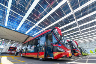 Why does China, a developing country, remain committed to carbon reduction?